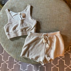 New with tags (never worn) 2 piece matching top/shorts set. Perfect for summer!